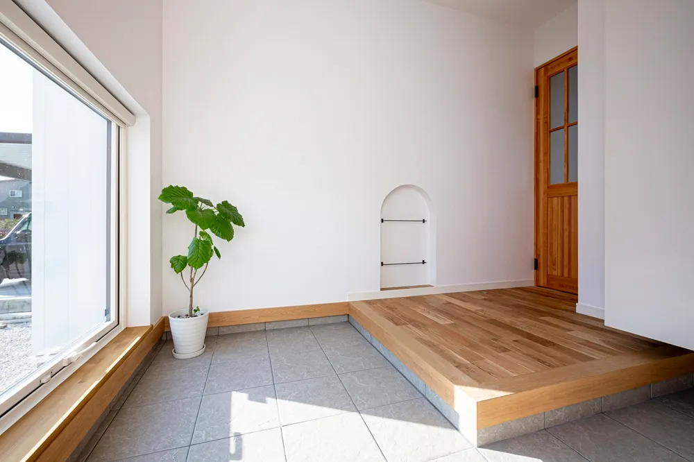 吹抜けを中心に回遊動線で家族が繋がる家