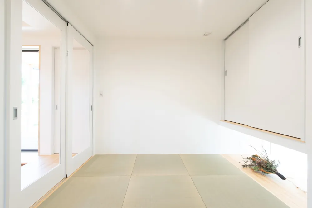 家族のこだわりと工夫を詰め込んだ、木の質感が心地よい家