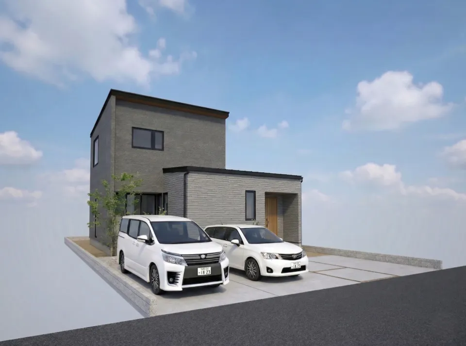 ２色のチタングレー外壁を組み合わせた、洗練された大人の外観デザイン。