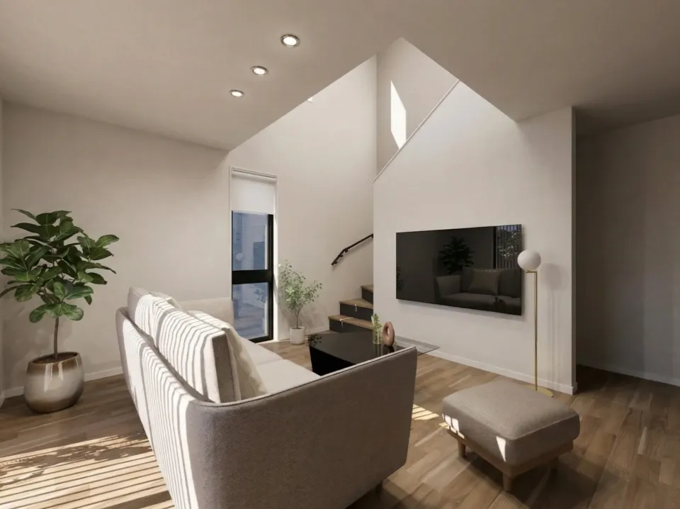 階段背面のアクセントクロスが、空間に奥行きを与えるリビング。